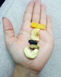 Close-up of hand holding fruit