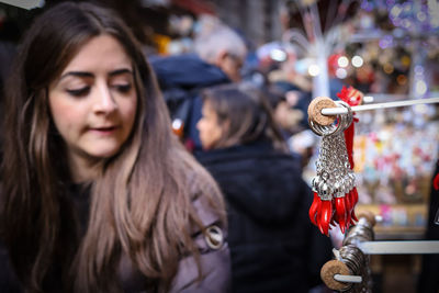 Woman looking at decorations