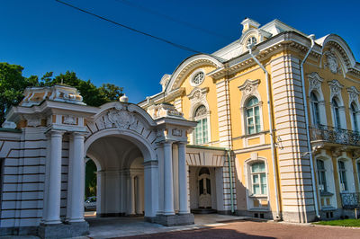 Low angle view of building against clear blue sky