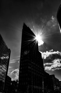 Low angle view of modern buildings against sky in city