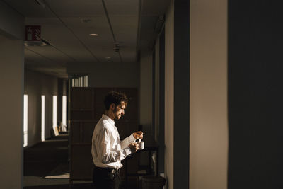 Man having coffee at office