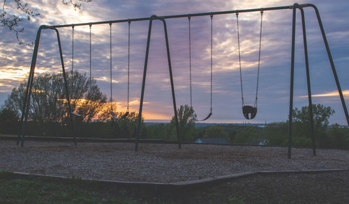 Scenic view of field against sky during sunset