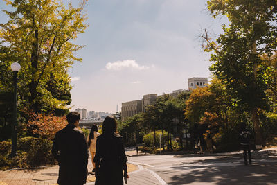 People walking on city street