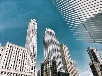 Low angle view of modern buildings against sky