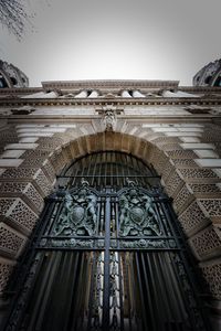 Low angle view of ornate building against sky