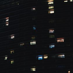 Illuminated buildings in city at night