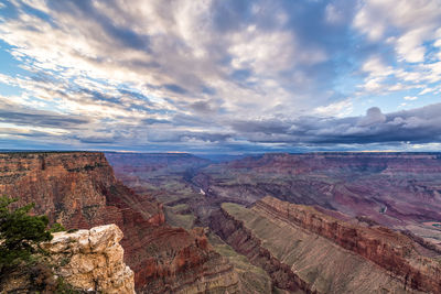 Scenic view of landscape against cloudy sky at grand canyon national park