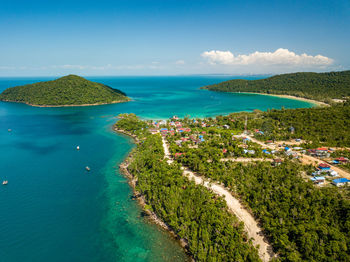 Aerial view of townscape by sea