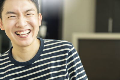 Portrait of young man smiling