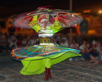 Close-up of illuminated carousel in amusement park