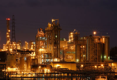 Illuminated buildings in city at night