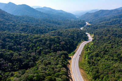 High angle view of trees and mountains against sky