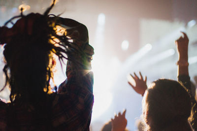 People enjoying music concert