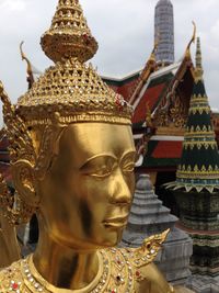 Close-up of statue against temple