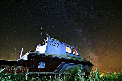 Low angle view of stars in sky at night