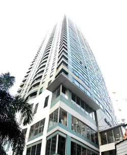 Low angle view of modern building against clear sky