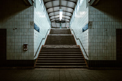 Steps in illuminated corridor