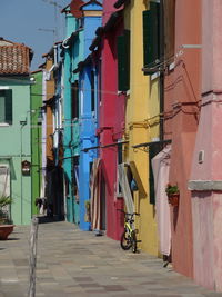 Alley amidst buildings in city