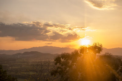 Scenic view of mountains against sky during sunset