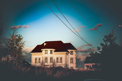 Buildings against sky at dusk