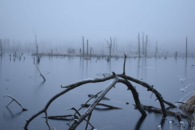 Scenic view of frozen lake against sky