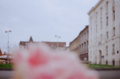 Defocused image of building against sky
