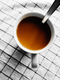 High angle view of coffee cup on table