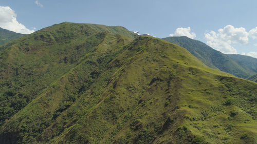 Aerial view of mountains covered forest, trees against the sky and region. luzon, philippines. 