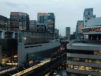 High angle view of buildings in city against sky