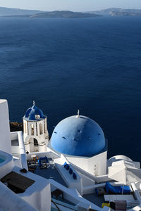 High angle view of building against blue sea