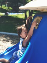Portrait of girl playing in playground