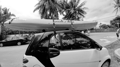 Cars on road against sky