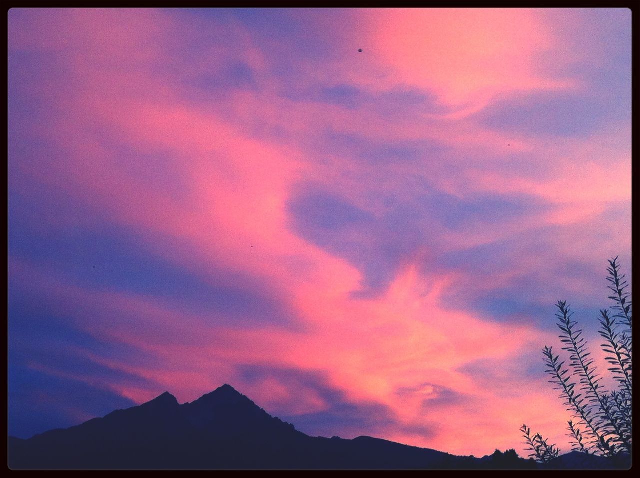 sunset, silhouette, sky, scenics, beauty in nature, transfer print, orange color, tranquil scene, mountain, tranquility, cloud - sky, dramatic sky, nature, idyllic, cloud, auto post production filter, mountain range, cloudy, landscape, moody sky