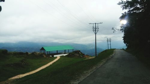 Empty country road along landscape