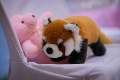 Close-up of stuffed toy on bed