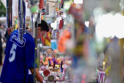 Man standing at market stall