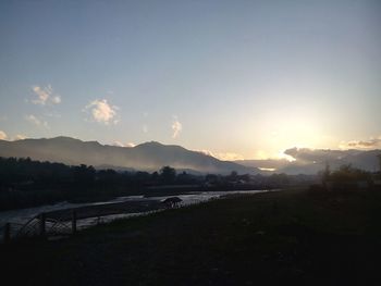 Scenic view of mountains at sunset