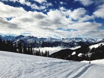 Scenic view of snowcapped mountains against sky