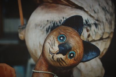 Close-up of stuffed toy on wood