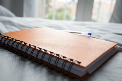 Close-up of pen on table