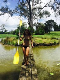 Woman standing in water