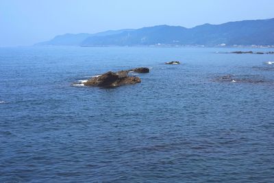 Scenic view of sea against clear sky