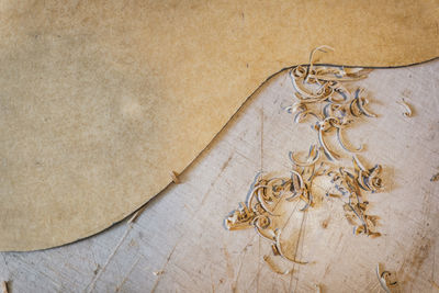 High angle view of carving on paper