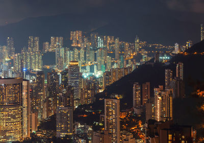 Aerial view of illuminated modern buildings in city