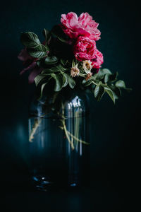 Close-up of rose bouquet against black background