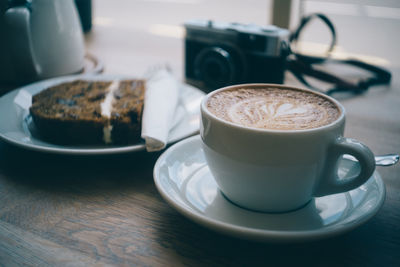Close-up of coffee cup on table