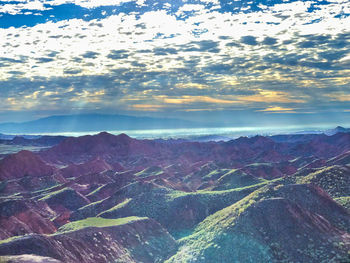 Aerial view of landscape against sky during sunset