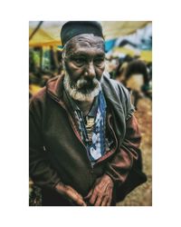 Portrait of man standing outdoors