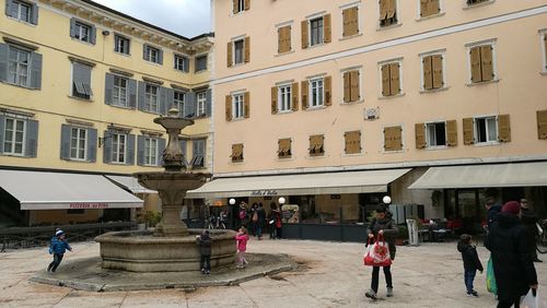 Group of people in front of building