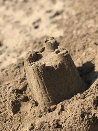 Close-up of stones on sand